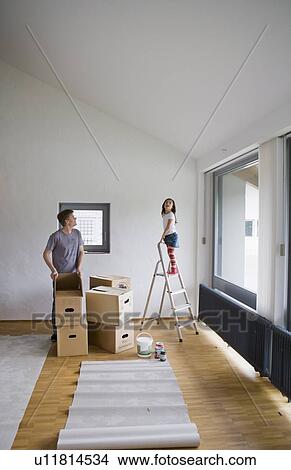 Father and daughter painting new house View Large Photo Image Picture - Father and daughter painting new house. Fotosearch