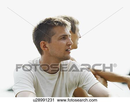 Men sitting together outdoors View Large Photo Image Stock Image - Men sitting together outdoors. Fotosearch