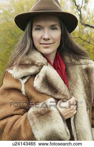 Older woman wearing fur lined coat View Large Photo Image Stock Photography - Older woman wearing fur lined coat. Fotosearch