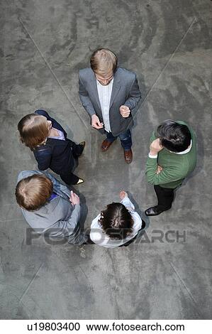 Overhead view of business people View Large Photo Image Stock Image - Overhead view of business people. Fotosearch