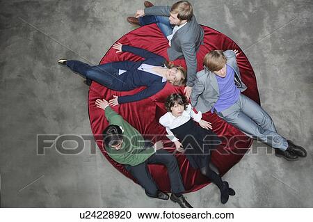 Overhead view of business people View Large Photo Image Stock Image - Overhead view of business people. Fotosearch