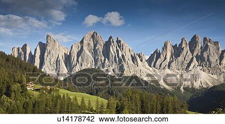 Stock Image - Rocky mountains in rural landscape. Fotosearch