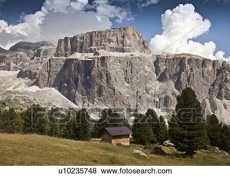 Stock Photo - Rocky mountains in rural landscape. Fotosearch