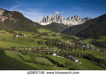 Rocky mountains overlooking rural valley View Large Photo Image Stock Photograph - Rocky mountains overlooking rural valley. Fotosearch
