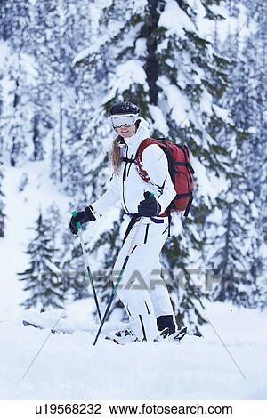 Skier smiling on snowy slope View Large Photo Image Stock Image - Skier smiling on snowy slope. Fotosearch
