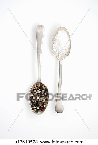 Spoonfuls of salt and pepper View Large Photo Image Stock Photo - Spoonfuls of salt and pepper. Fotosearch