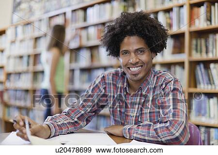 Student studying in library View Large Photo Image Stock Photo - Student studying in library. Fotosearch