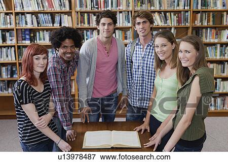 Students reading book in library View Large Photo Image Stock Photo - Students reading book in library. Fotosearch