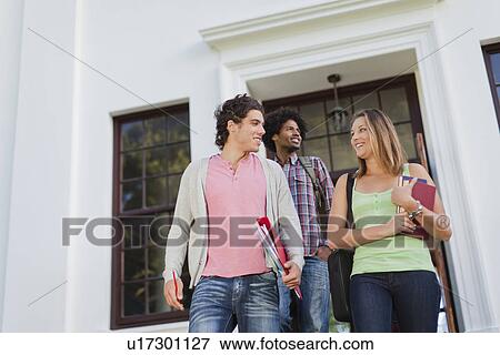 Stock Photo - Students walking together on campus. Fotosearch