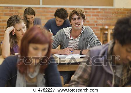 Students working in class View Large Photo Image Stock Photo - Students working in class. Fotosearch