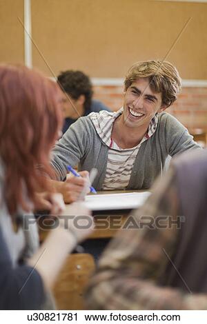 Students working together in class View Large Photo Image Stock Image - Students working together in class. Fotosearch