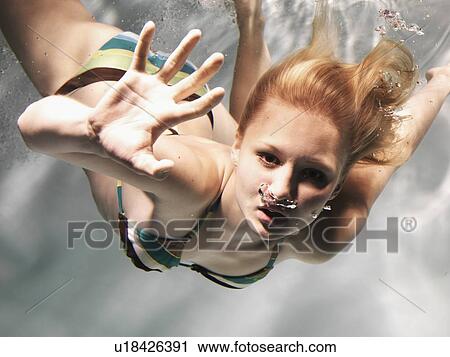 Swimming woman reaching out View Large Photo Image Stock Image - Swimming woman reaching out. Fotosearch