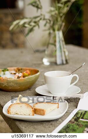 Stock Photo - Table set with breakfast food. Fotosearch