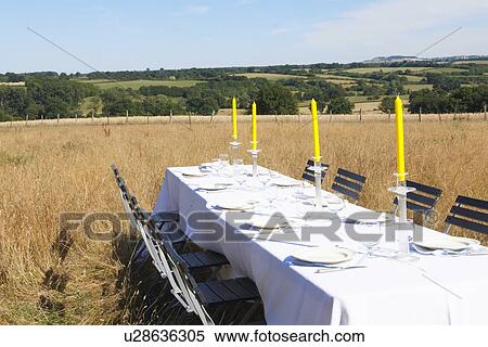 Table settings in wheatfield View Large Photo Image Stock Photography - Table settings in wheatfield. Fotosearch