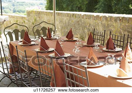 Table settings outdoors View Large Photo Image Stock Photo - Table settings outdoors. Fotosearch