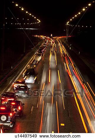 Time-lapse view of traffic at night View Large Photo Image Stock Photo - Time-lapse view of traffic at night. Fotosearch