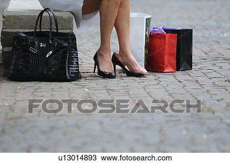 Woman with shopping bags and purse View Large Photo Image Stock Image - Woman with shopping bags and purse. Fotosearch