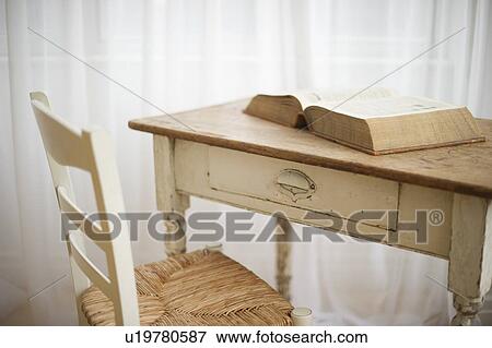 Stock Photo - Antique table and book. Fotosearch