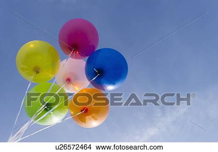 Picture - Balloons against blue sky. Fotosearch