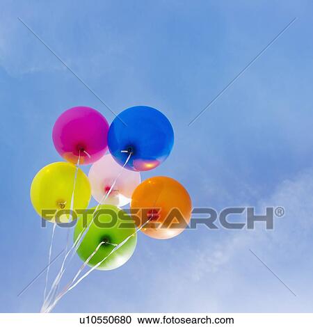 Balloons against blue sky View Large Photo Image Stock Image - Balloons against blue sky. Fotosearch