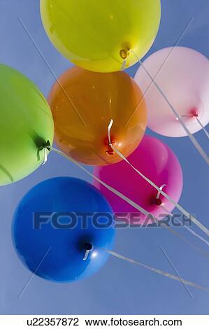 Stock Image - Balloons against blue sky. Fotosearch