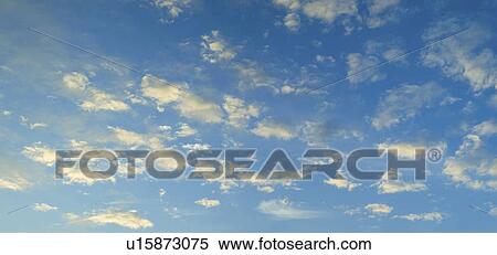 Blue sky with clouds View Large Photo Image Stock Photography - Blue sky with clouds. Fotosearch