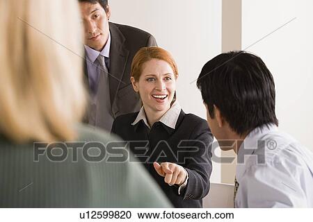 Business people at meeting View Large Photo Image Stock Image - Business people at meeting. Fotosearch