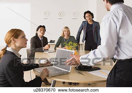 Business people at meeting View Large Photo Image Stock Image - Business people at meeting. Fotosearch