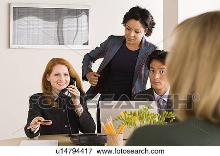 Business people at meeting View Large Photo Image Stock Photo - Business people at meeting. Fotosearch