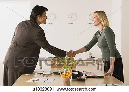 Business people shaking hands View Large Photo Image Stock Image - Business people shaking hands. Fotosearch