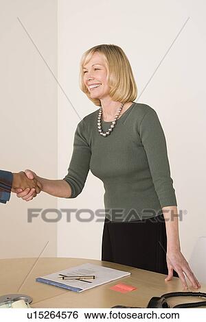 Business people shaking hands View Large Photo Image Stock Photograph - Business people shaking hands. Fotosearch