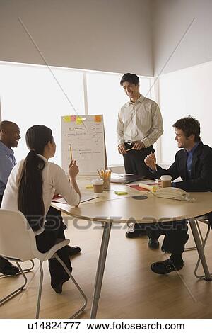 Business people working in office View Large Photo Image Stock Photo - Business people working in office. Fotosearch