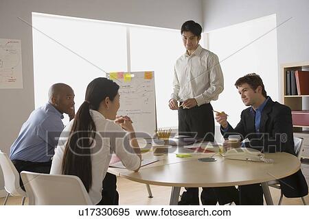 Business people working in office View Large Photo Image Stock Photography - Business people working in office. Fotosearch
