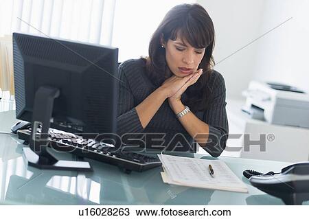 Business woman reading documents View Large Photo Image Stock Image - Business woman reading documents. Fotosearch