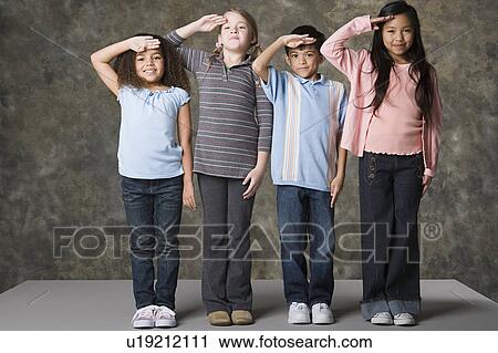 Children (6-7, 8-9) saluting, studio shot View Large Photo Image Stock Image - Children (6-7, 8-9) saluting, studio shot. Fotosearch