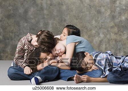 Children (6-7, 8-9) sleeping together, studio shot View Large Photo Image Stock Photo - Children (6-7, 8-9) sleeping together, studio shot. Fotosearch