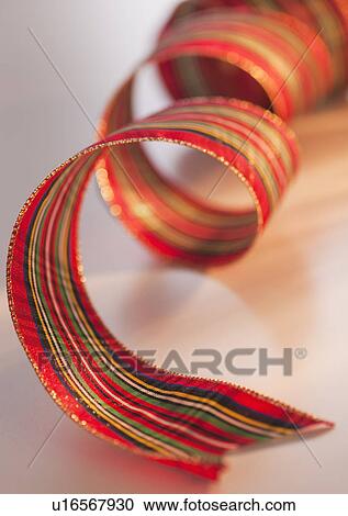 Stock Image - Close-up of christmas ribbon. Fotosearch