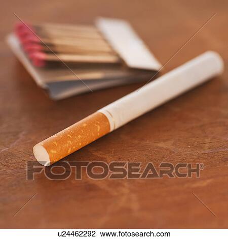 Close up of cigarette and matches View Large Photo Image Stock Image - Close up of cigarette and matches. Fotosearch