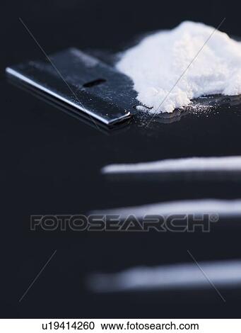 Close up of cocaine and razor on black background View Large Photo Image Stock Image - Close up of cocaine and razor on black background. Fotosearch