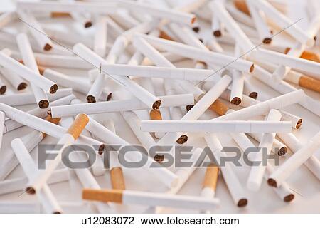 Close up of heap of cigarettes View Large Photo Image Stock Image - Close up of heap of cigarettes. Fotosearch