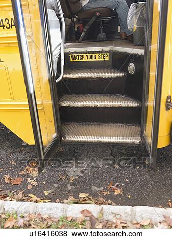 Stock Photo - Close up of open door of school bus. Fotosearch