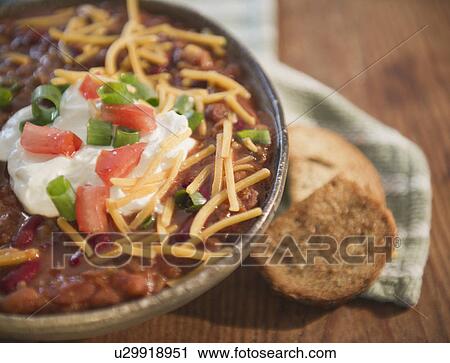 Close up of stew with chili View Large Photo Image Stock Image - Close up of stew with chili. Fotosearch