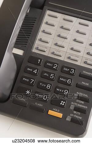 Close-up view of office telephone View Large Photo Image Stock Photo - Close-up view of office telephone. Fotosearch