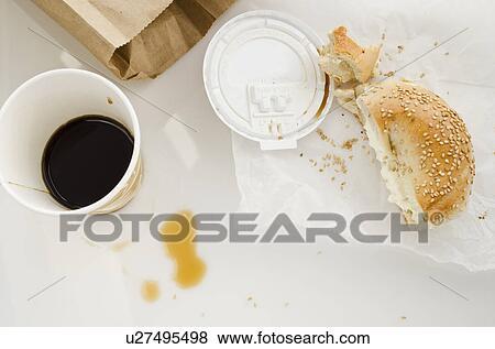 Stock Photo - Coffee and bun, studio shot. Fotosearch