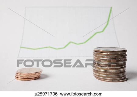 Coins and graph, studio shot View Large Photo Image Stock Photograph - Coins and graph, studio shot. Fotosearch