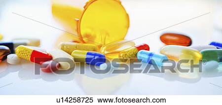 Colorful pills and capsules, studio shot View Large Photo Image Stock Photography - Colorful pills and capsules, studio shot. Fotosearch