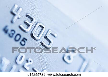 Detail of credit card, studio shot View Large Photo Image Stock Photo - Detail of credit card, studio shot. Fotosearch