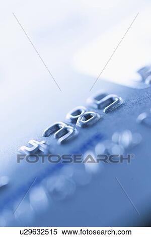 Stock Photography - Detail of credit card, studio shot. Fotosearch