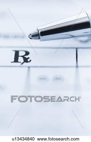 Stock Image - Detail of prescription with ballpoint pen, studio shot. Fotosearch