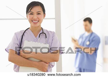 Doctor and nurse in hospital View Large Photo Image Stock Image - Doctor and nurse in hospital. Fotosearch